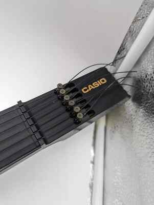 Casio DG20 Digital Midi Guitar USED produces sound, but it