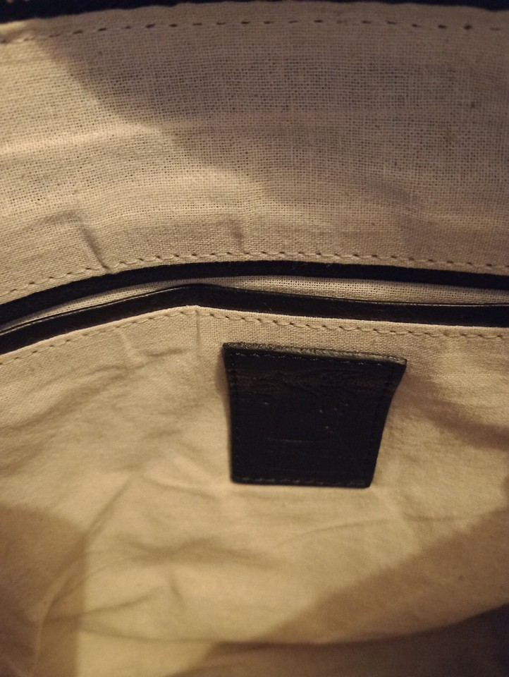 Conkca. London. NEW. Black Real Leather Cross body Bag/Brand