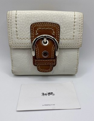 Coach SOHO White & Brown Pebbled Leather Bifold Wallet W/ Buckle Accent On Flap.