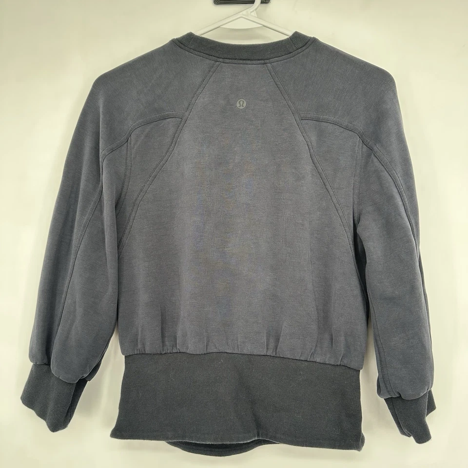 Pullover para mujer Lululemon Softstreme dobladillo acanalado negro minimalista Athleisure 4 Foto 2 de 4