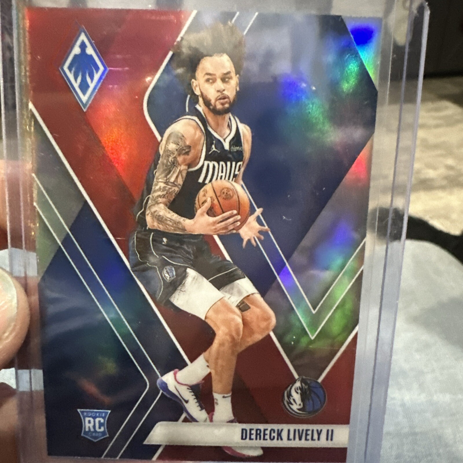 2023-24 Panini Phoenix - Rookies Red #290 Dereck Lively /199 (RC) Mavericks