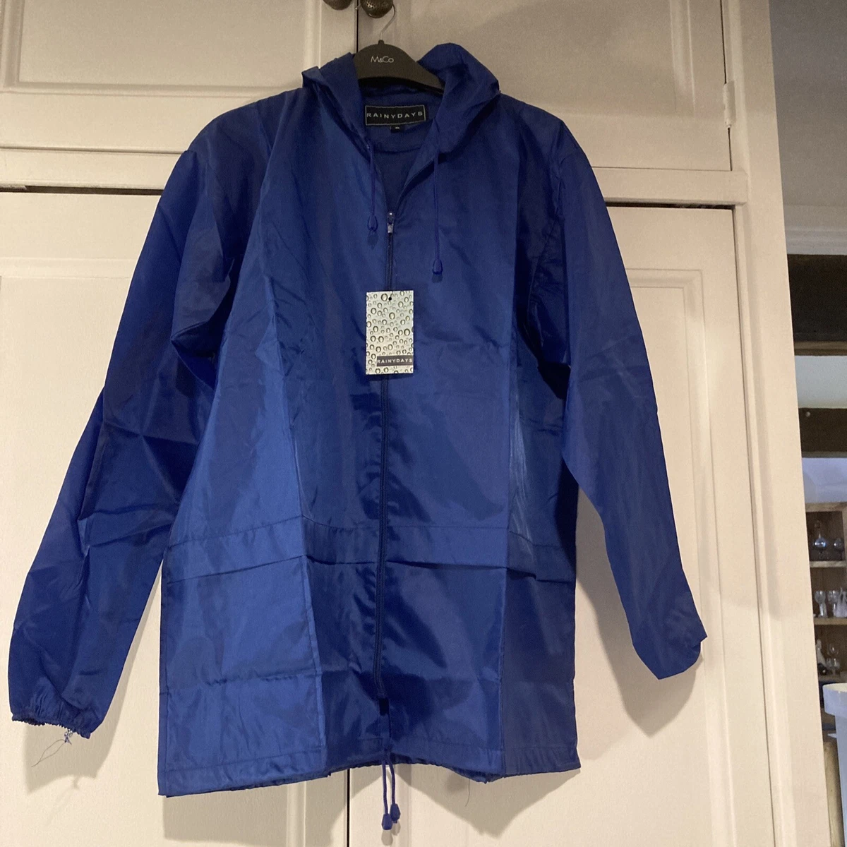 Rainydays zip front blue kagoul light rain jacket with hood. Flap pockets