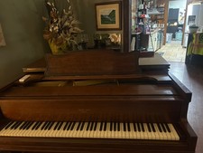 self playing baby grand piano