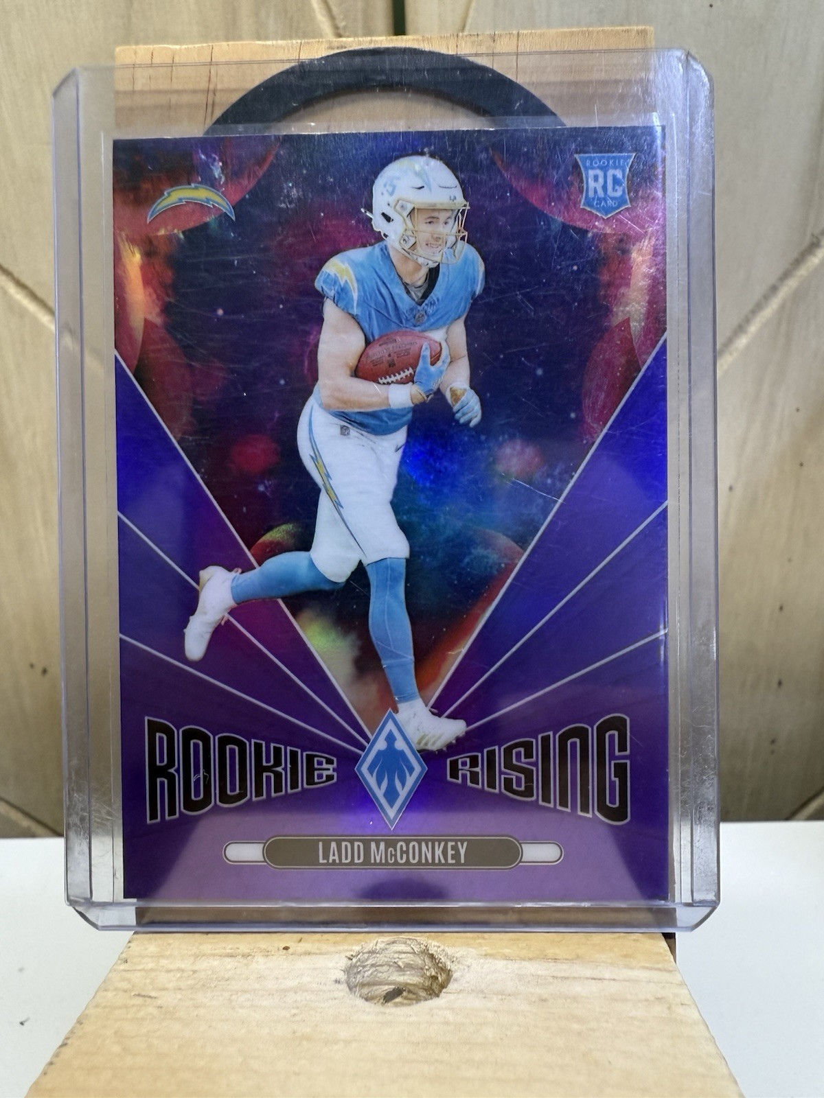 2024 Panini Phoenix - Rookie Rising Ladd McConkey #RR-LMY Purple (RC)