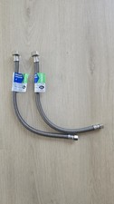 Two BrassCraft 3/8 in x 1/2 in. FIP x 16 in. Braided Polymer Faucet Connector