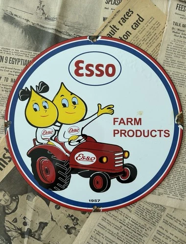 VINTAGE 1957 ESSO FARM PRODUCTS OIL GAS DEALER 12 INCH PORCELAIN ENAMEL SIGN