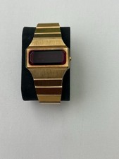  vintage 1970s Benrus gold-plated LED digital watch. 