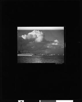 View of the Long Beach skyline with ship passing by in foreground - Old Photo