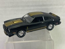 1/43 GREENLIGHT 1977 FORD MUSTANG II COBRA II BLACK WITH GOLD STRIPES