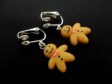 A PAIR OF VERY CUTE GINGERBREAD MAN  GIRLS  CLIP ON EARRINGS. NEW.