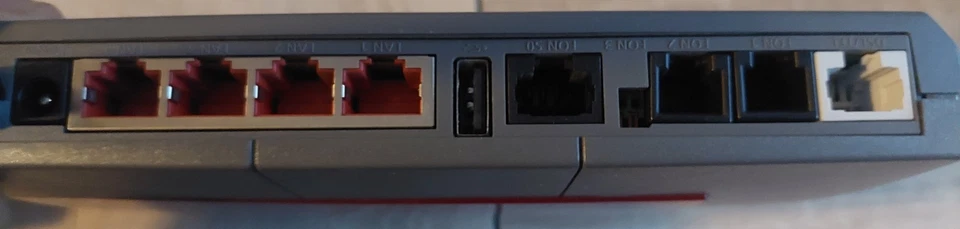 AVM FRITZ!Box Fon WLAN 7170 Rot, 2 Netzteile, 3 Adapter auf Analog - Bild 3 von 3