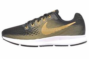 nike black and gold shoes