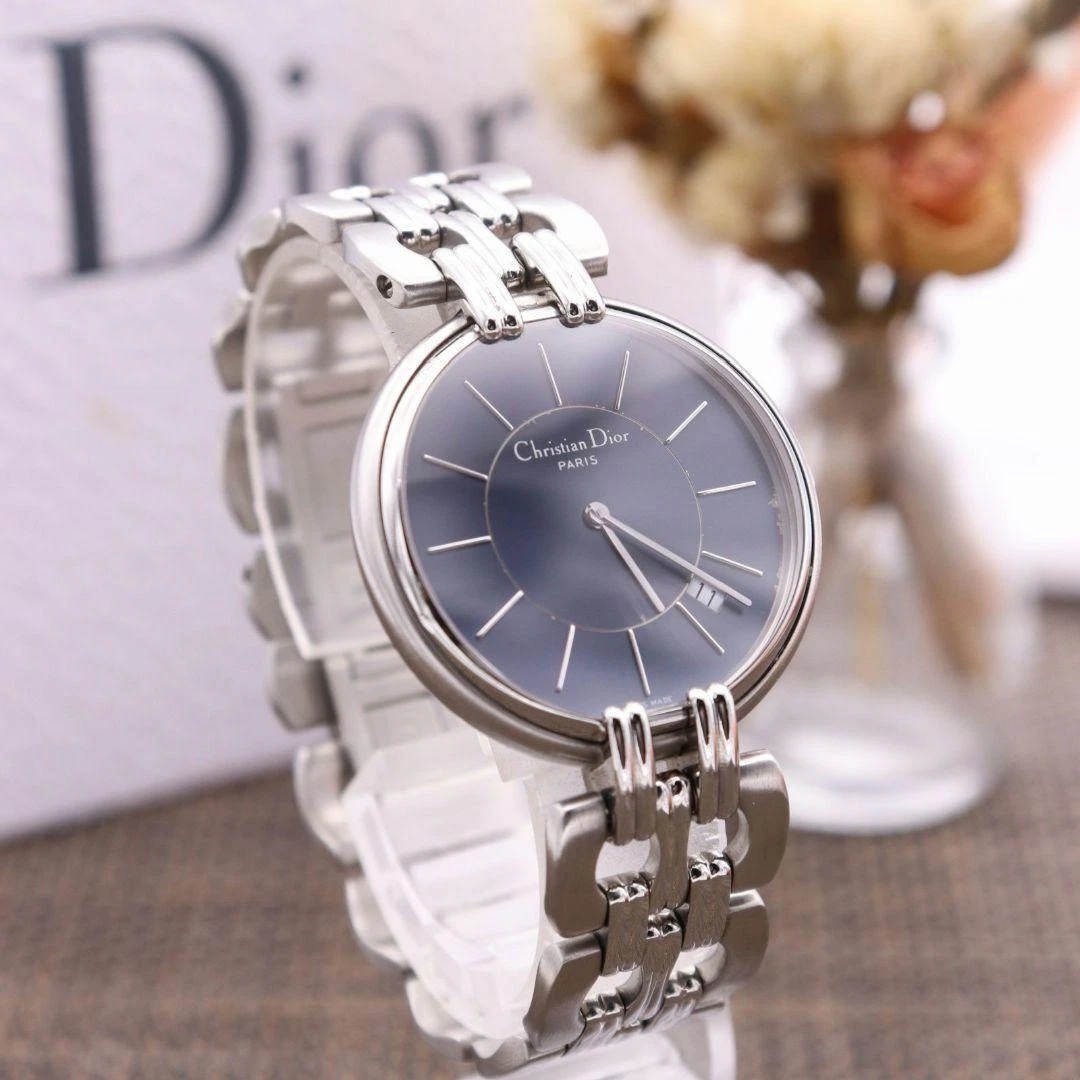 Montre Christian Dior D65 100 32 mm cadran marine quartz argenté femme vintage fonctionne