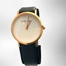 Nine West Women’s Minimalist Quartz Analog Watch Rose Gold Case White Dial