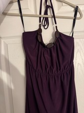 Bisou Bisou purple dress with wooden detail around neckline