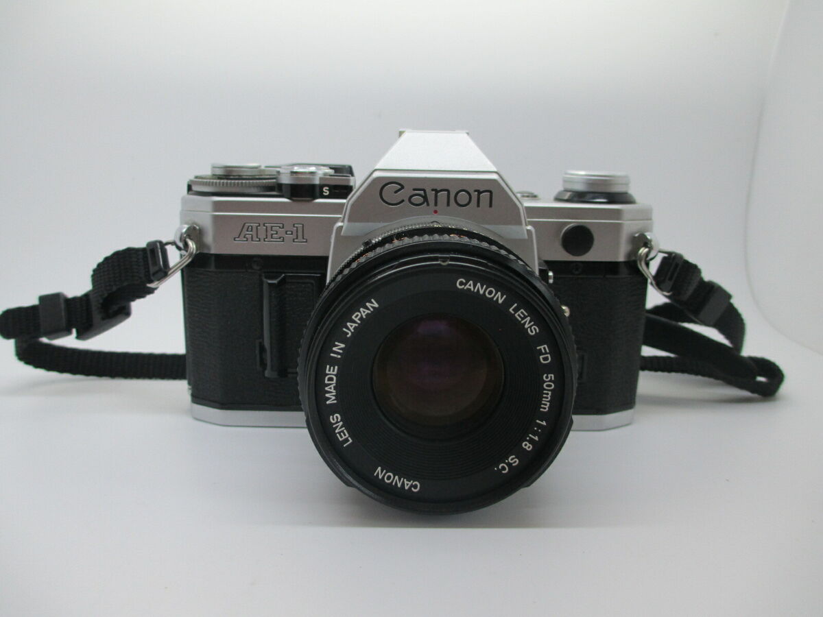 Canon AE-1 35mm SLR Film Camera with Canon 50mm f/1.8 FD Lens - WORKING  PERFECT!