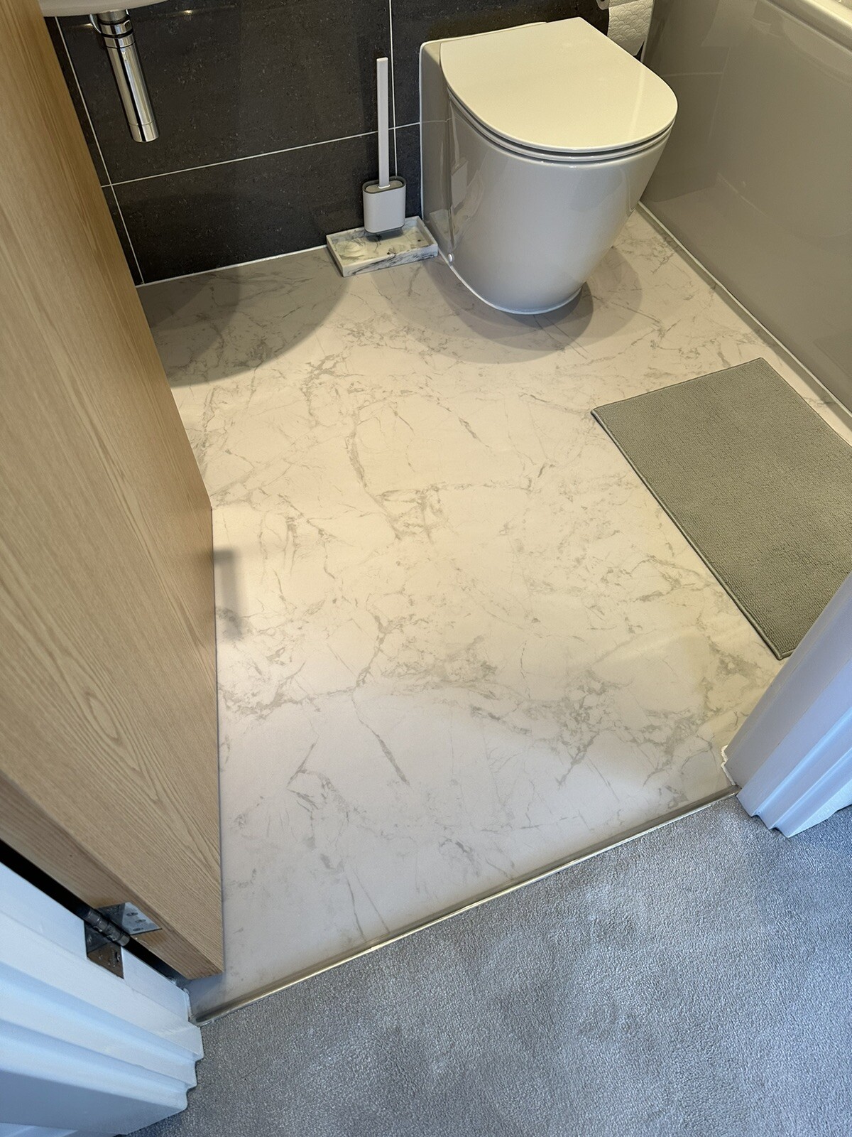 Forbo Eternal Material vinyl flooring roll remnant in White Marble