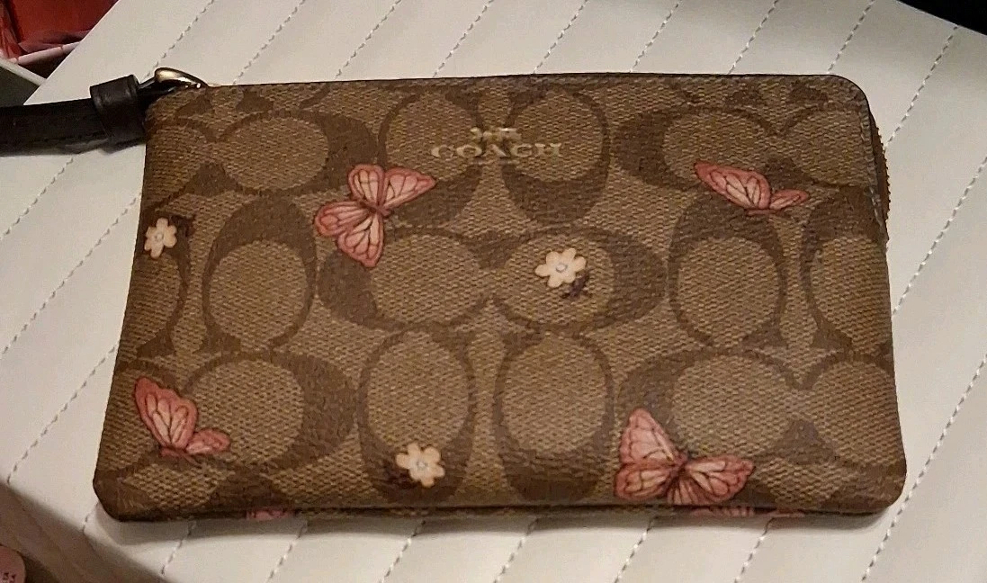 Coach Zippy Pouch da polso con stampa farfalla CC firmata