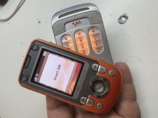 Sony Ericsson Walkman W550i spin Unlock Mobile Phone Orange Silver Colour