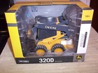 ERTL JOHN DEERE 320D SKIDSTEER - NIB — photo 8