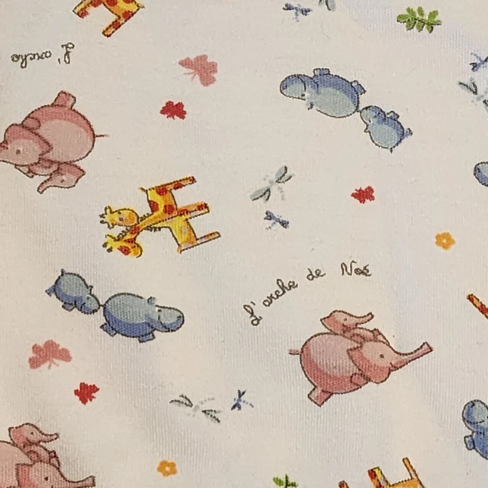 Manta bebé Kissy Kissy Arca de Noé blanca rosa jirafa elefante hipopótamo Foto 2 de 4