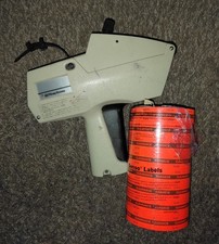 Monarch 1170 Pricing Gun With Eight Rolls Fluorescent Orange Labels Tan