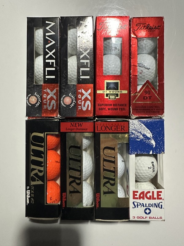 24 vintage golf balls never used- Maxfli, Titleist, Ultra from 1990s