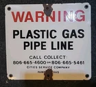Vintage Porcelain Metal Sign WARNING PLASTIC PIPE LINE 10X9" Pampa TX Used Old