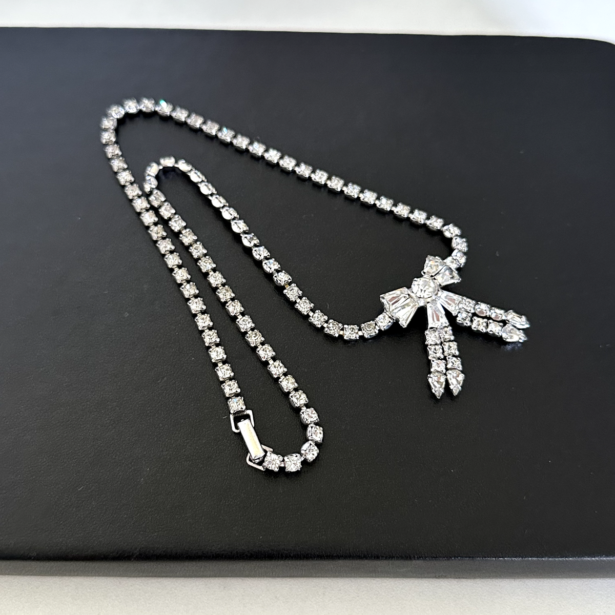 Vintage Parco Designer Clear Ice Rhinestone Silver Tone Bow