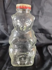 Snow Crest Beverages Vintage Sitting Bear Glass Bank 7" Tall.        SS