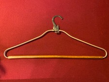Vintage Metal Clothes Hanger with rotating latch possibly vintage steam trunk