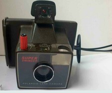الكاميرات — Polaroid فائق Swinger