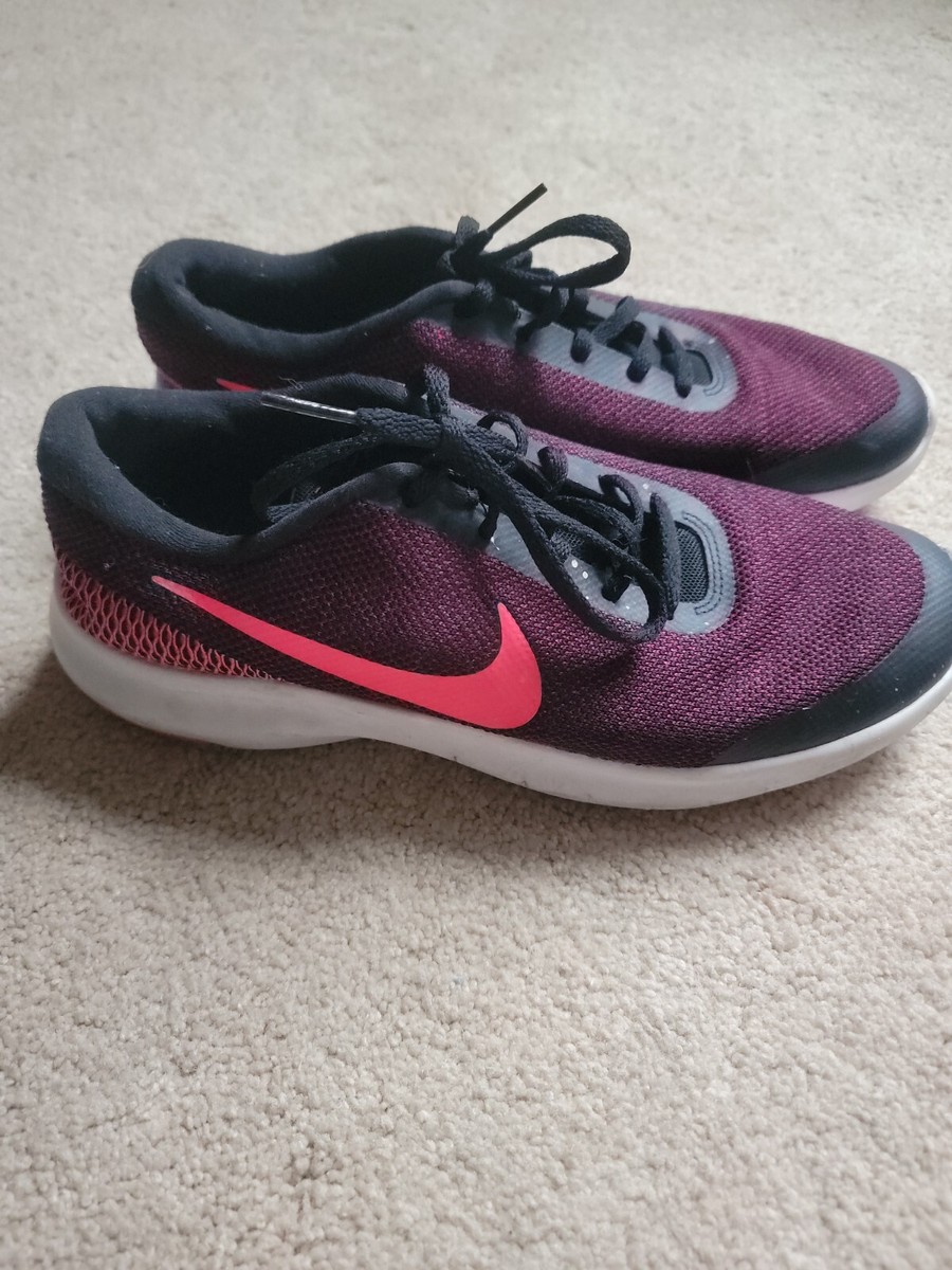 red and purple nike shoes