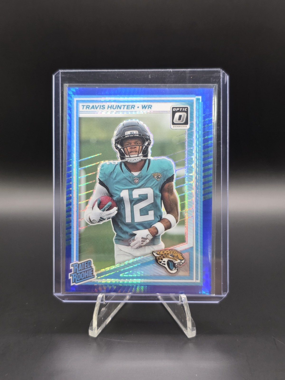 2025 Panini Donruss Optic - Rated Rookie Travis Hunter #201 Blue Hyper Prizm...