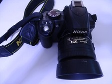 Nikon D3100 DSLR Camera With Strap, AF-S Nikkon 35mm 1:1.8G Lens.