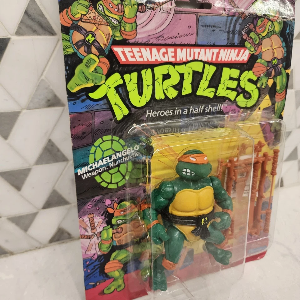 Figura de colección TMNT Tortugas Ninja Michaelangelo 1988 Playmates nueva en tarjeta Foto 3 de 4