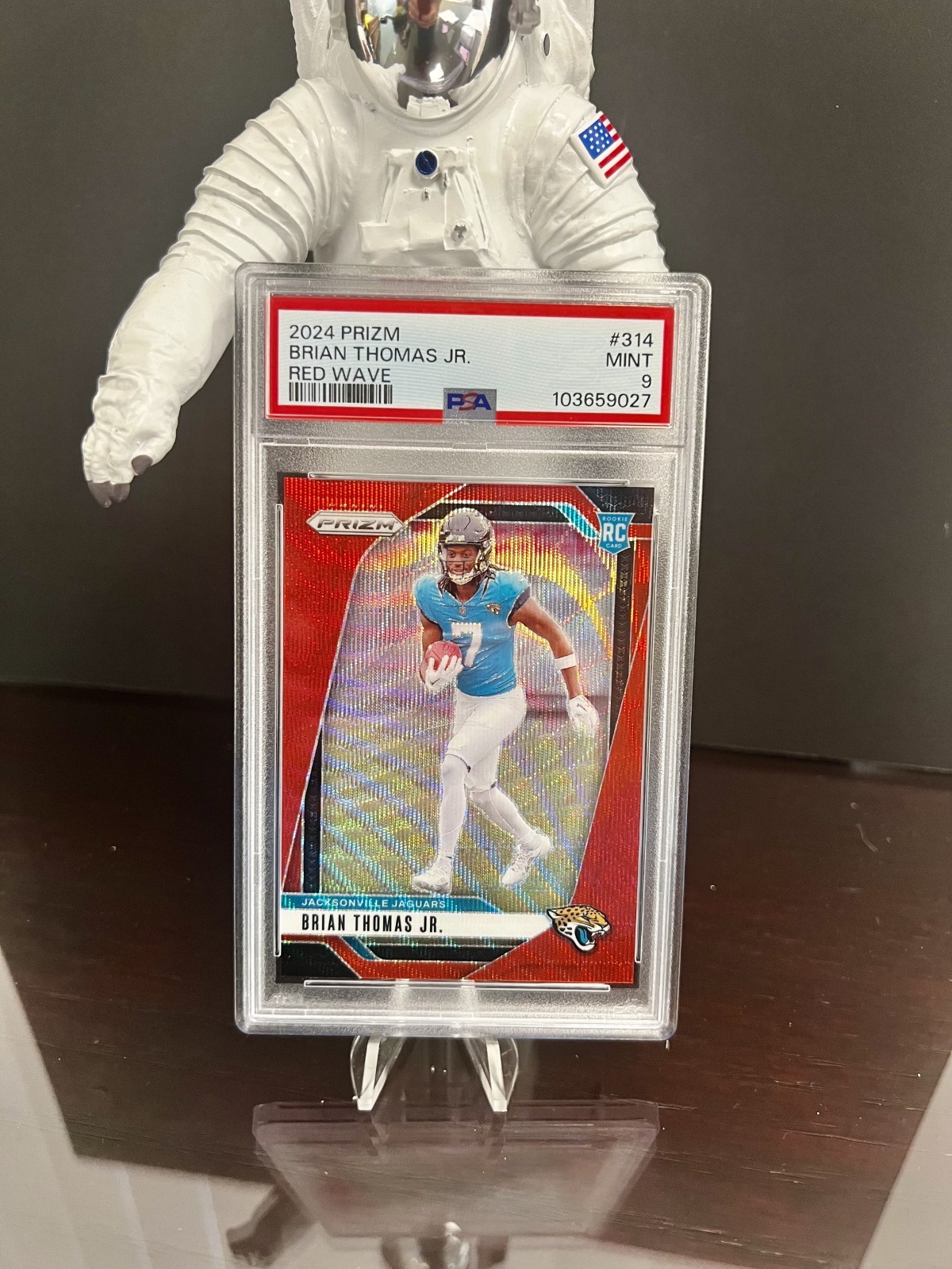 2024 Panini Prizm - Rookies Brian Thomas Jr. #314 Red Wave Prizm /149 (RC)