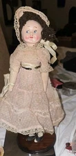 Antique Doll. Fabric Body Hardish Face.    Hand Painted 