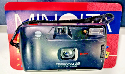 MINOLTA FREEDOM 35 FOCUS-FREE BUILT-IN FLASH 35MM CAMERA, GOOD WORKING COND.