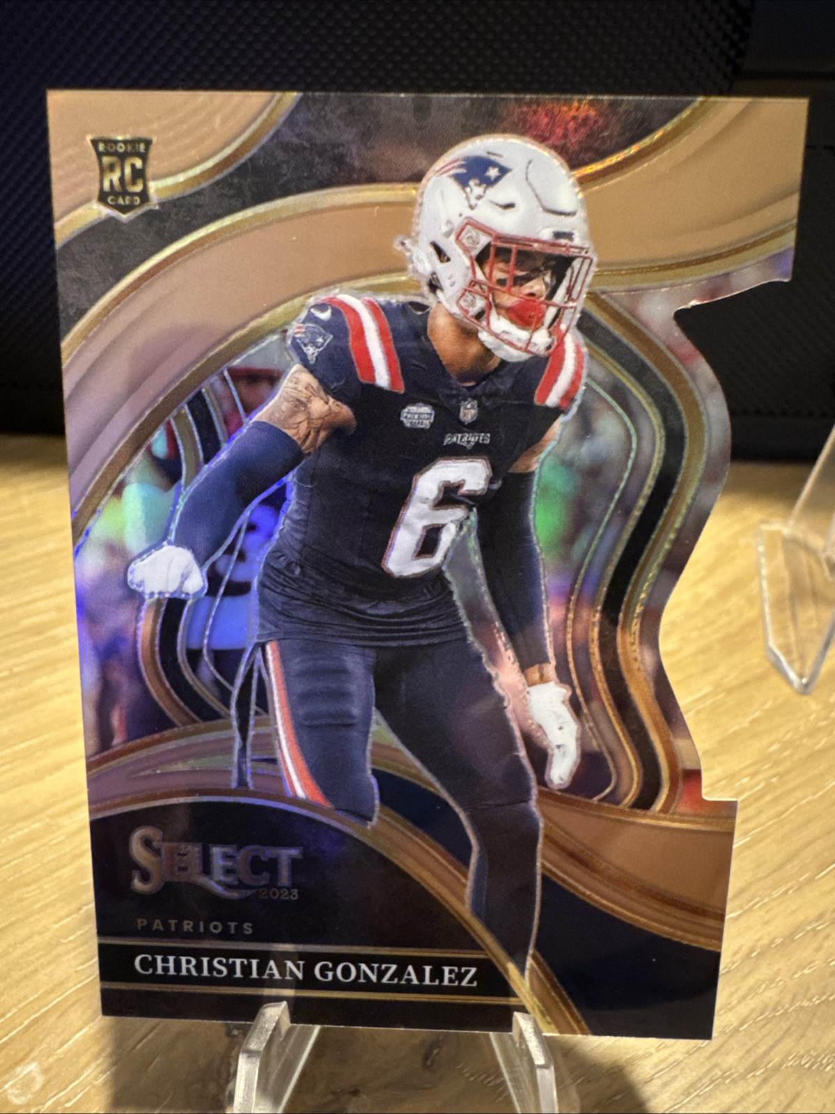 2023 Panini Select #286 Christian Gonzalez Copper Prizms Die Cuts #/299