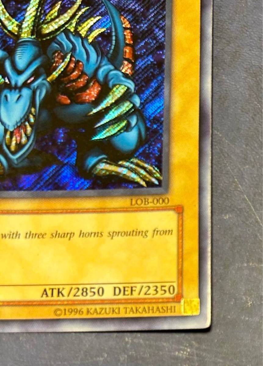 LOB-000 - Tri-Horned Dragon - 1st Edition - Secret Rare - NM