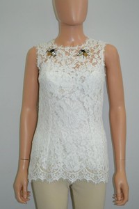 white lace sleeveless blouse