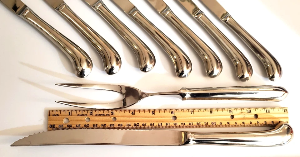 JUEGO DE TALLA DE ACERO INOXIDABLE (Cuchillo y Tenedor) y 7 CUCHILLOS PARA CARNE - Excelente estado Foto 3 de 4