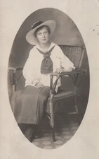 Vintage RPPC POSTCARD- Woman wears white top puffy sleeves & a sailor collar