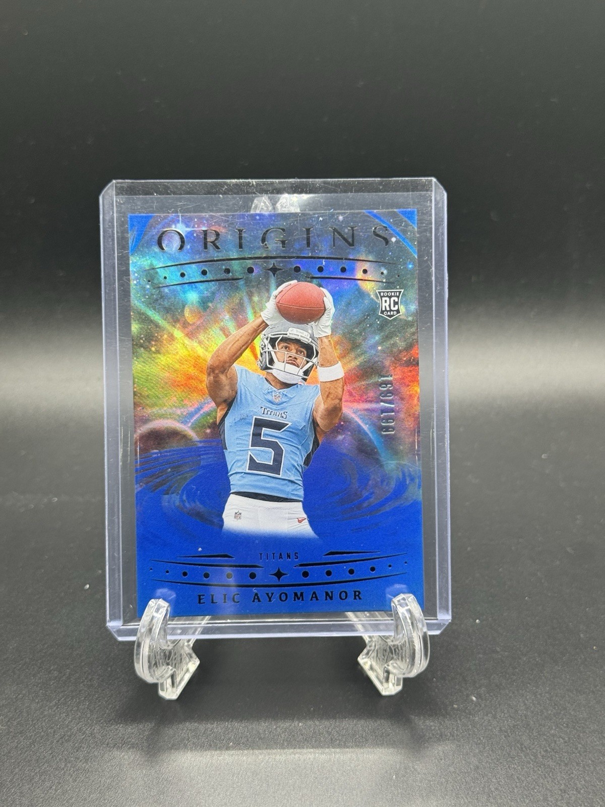 2025 Panini Origins- Elic Ayomanor #108 Holo Blue /199 (RC)