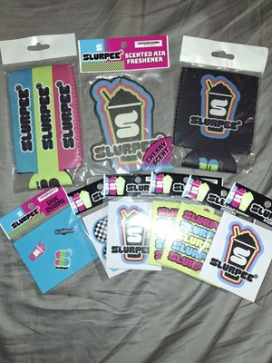 7-Eleven Slurpee Assorted Merch, Cozies, Stickers, Croc Charms And More