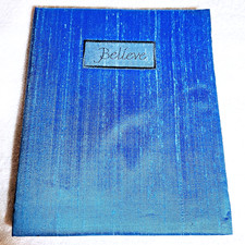 Blank Lined Journal Notebook, "Believe" on the cover, Shiny Blue Fabric, UNUSED 