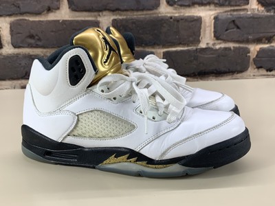 black and gold jordan 5