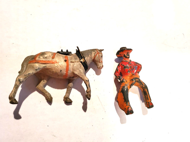 Vintage toy lead Cowboy riding horse ( separate figures )