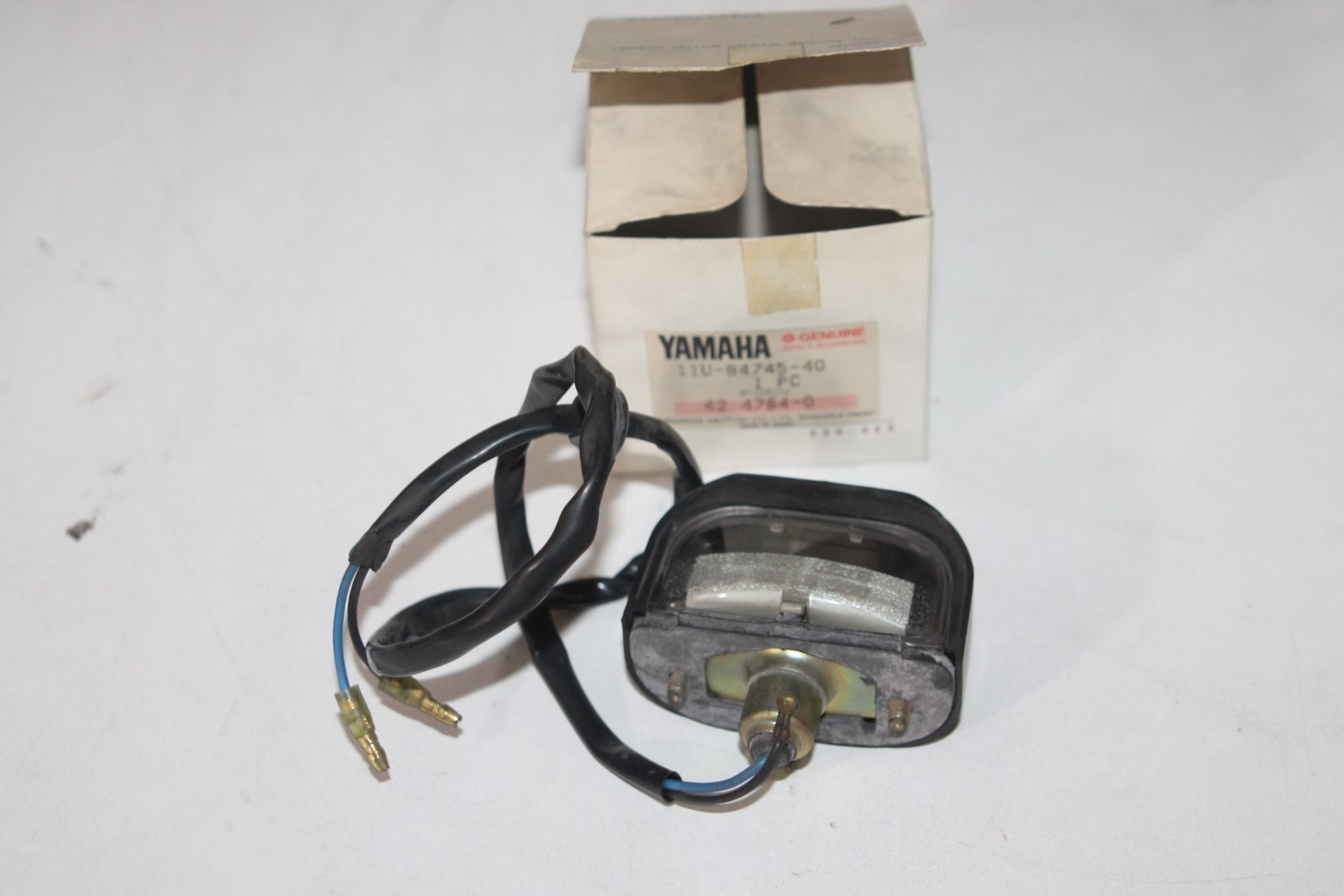 Éclairage de plaque Yamaha 11U-84745-40 d'origine NOS pour moto vintage